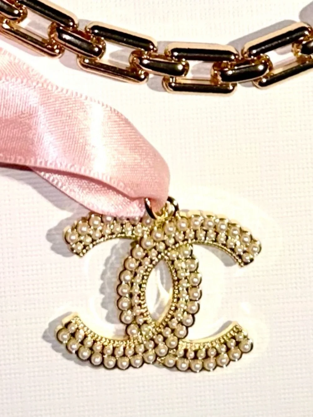 CHANEL Gold CC Pendant with Pink Ribbon New Elegant Chain